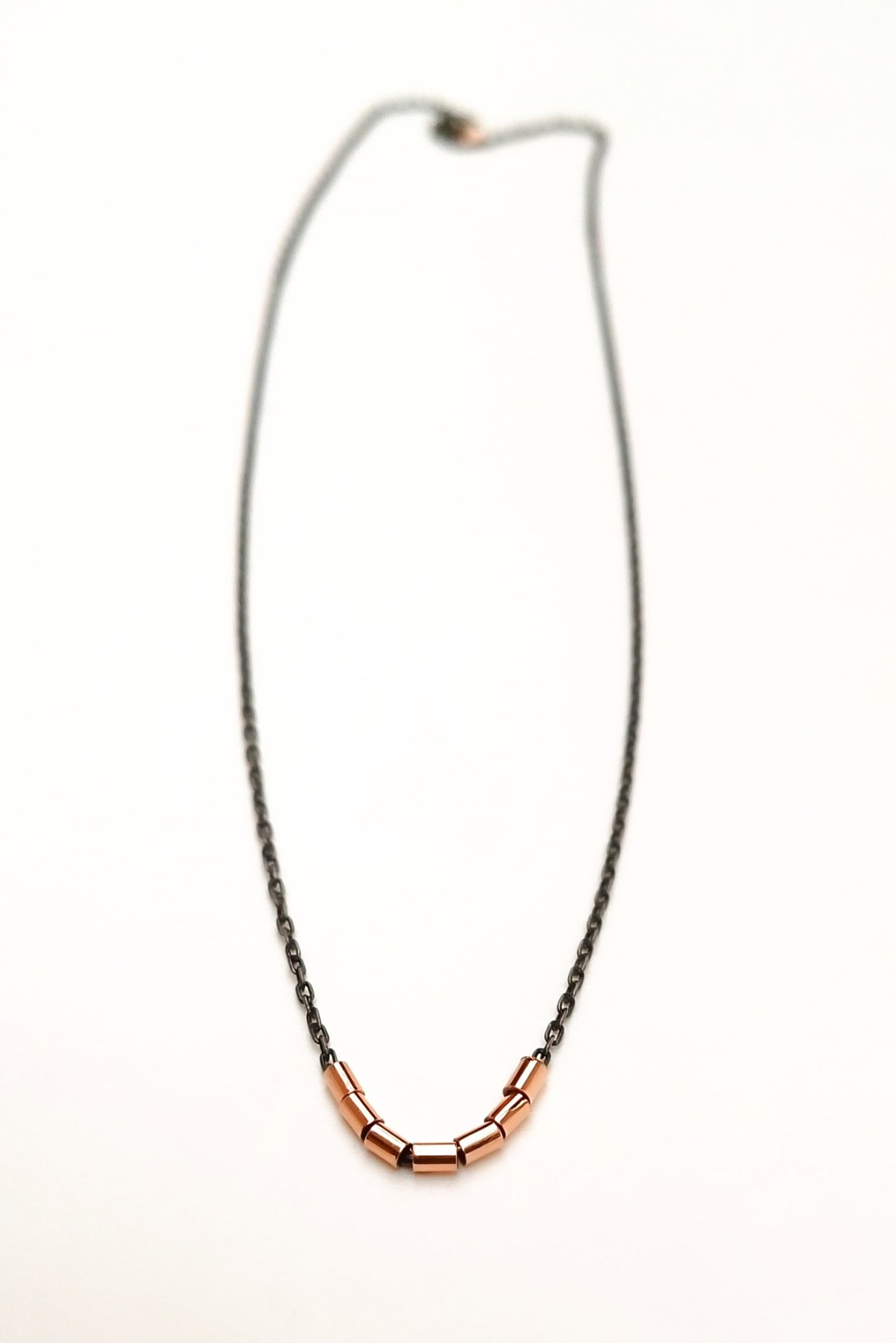 Colgante de oro 18K y plata negra