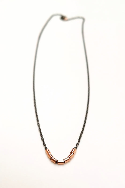 Colgante de oro 18K y plata negra